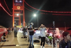 Tren Pengamen Online di TikTok di Jembatan Ampera: Cara Baru Meraup Cuan