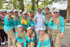 IkutLomba Gerak Jalan DPKBP3A Kampanyekan Program KB di Hadapan Dewan Juri