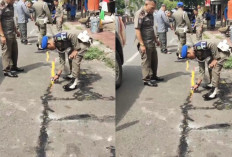 Pol PP Hapus Coretan di Jalan; Kadin Kominfo Imbau Warga Tak Jualan di Jalan Sudirman saat Karnaval 