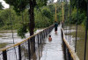 Air Sungai Rambang Meluap, Rendam Jembatan dan Rumah di Kecamatan RKT Prabumulih