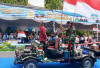 YPN Abadi Prabumulih Tampil Gagah ala TNI di Karnaval HUT Kota Prabumulih